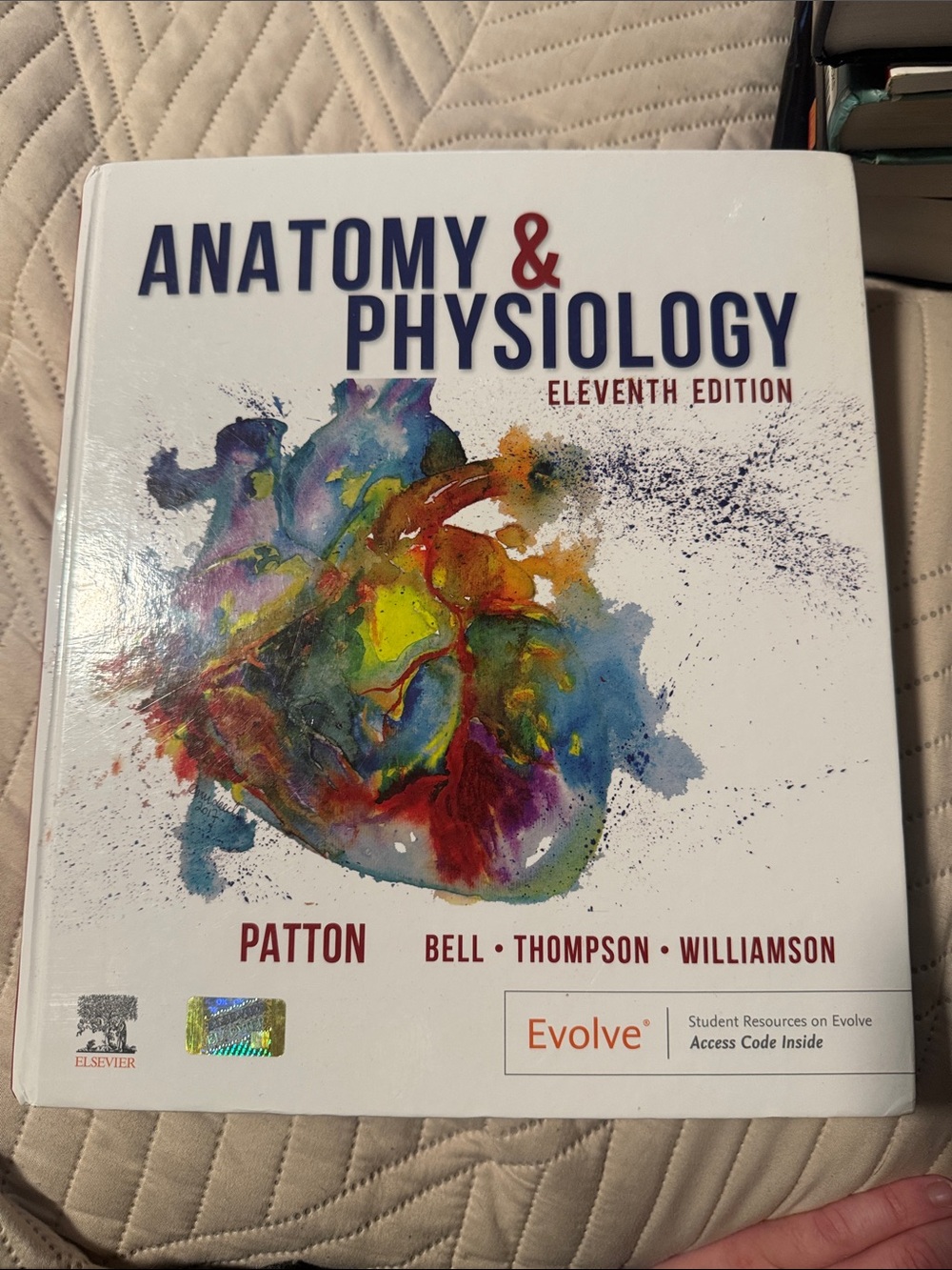 Anatomy & Physiology Eleventh Edition Textbook - White with Multicolor Cover Art